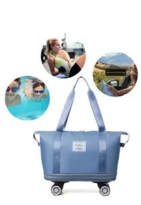 Light blue oxford cloth travel bag featuring bottom swivel wheels and scenary view details