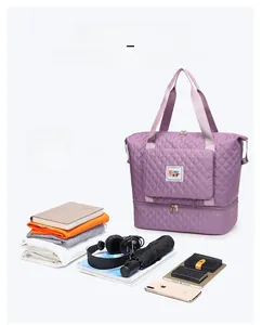 Detail of purple quilted travel tote with zipper extension and large storage capacity