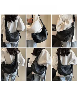 Detailed multi-angle views of black large-capacity nylon crossbody dumpling bag on model