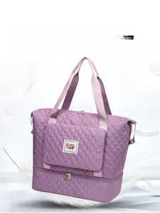 Detailed macro view of purple quilted oxford fabric and the NJJK logo on the travel bag