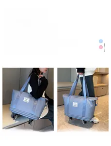Detail showing waterproof Oxford fabric and portable wheels of the blue travel bag