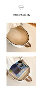 Interior view showing the large capacity of the quilted white backpack for books and gadgets