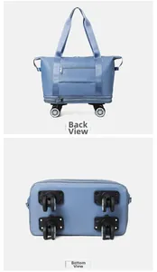 Detail view of blue oxford travel bag with back pocket and four swivel wheels on bottom