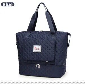 Close-up of blue quilted Oxford bag with a separate bottom zip compartment for shoes