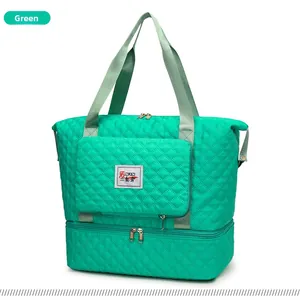 Detailed view of green quilted travel bag showing waterproof fabric and separate shoe compartment