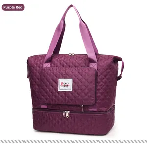 Detail view of purple quilted travel bag with waterproof nylon texture and expandable base