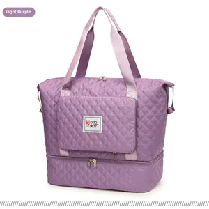 Close-up of light purple quilted Oxford bag with metal zipper and shoe compartment