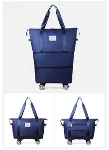 Deep blue expandable oxford bag with rolling wheels and multi-layer zipper capacity detail