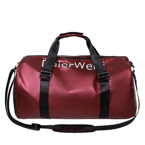 Waterproof burgundy oxford tote travel bag with adjustable shoulder strap and top handles