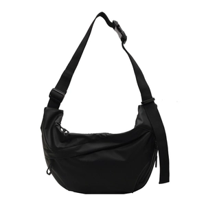 Minimalist black nylon crescent crossbody bag with adjustable wide shoulder strap