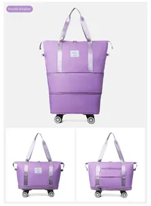Detail view of purple oxford travel bag with universal wheels and expandable bottom layer