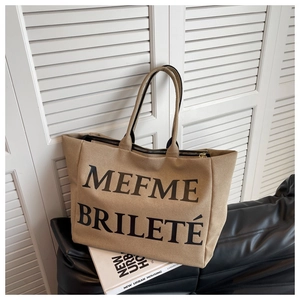 Grand sac cabas en toile avec lettrage noir et fermeture éclair sécurisée