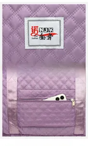 Detail view of purple quilted oxford travel bag with front logo and back zipper pocket