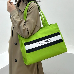 Sac fourre-tout en toile vert fluo avec rayures noires et bandoulière pour le quotidien