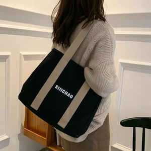 Large capacity canvas tote bag with SIJICHAO print and wide straps for daily commute