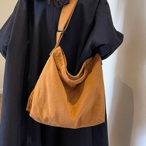 Large amber corduroy tote bag with adjustable shoulder strap for women's daily commute