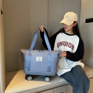 Light purple Oxford cloth travel tote bag with four wheels and large capacity style