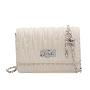 Beige quilted shoulder bag with V-shaped stitching and silver chain strap on white background