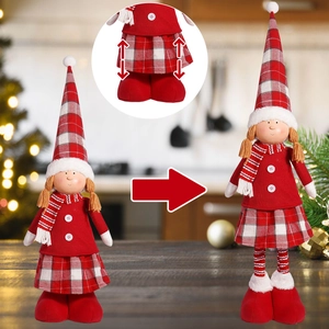 Detail showing the adjustable telescopic legs feature of the 20-inch Christmas doll