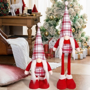 Detail of red and white checkered plush Christmas gnomes with long white beard and hats