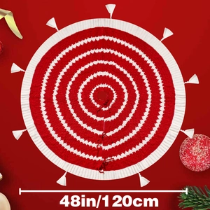 48 inch red and white knit Christmas tree skirt with tassels and festive decorations