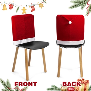 Front and back detail of red velvet Santa hat chair covers with white plush pom-pom