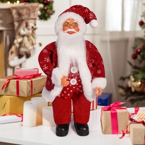 Close-up of 12-inch Santa Claus doll with red snowflake suit and gold glasses