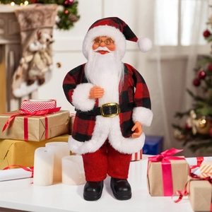 Close-up of 12-inch Santa Claus figurine in red buffalo plaid coat on festive table