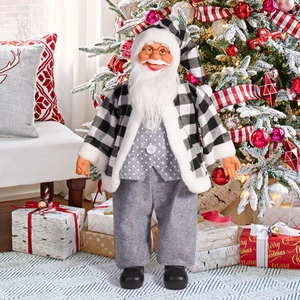 Close-up of 24 inch Santa Claus figurine with plaid coat and golden spectacles