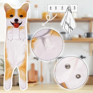 Detail of Corgi dog hand towel featuring snap button and soft microfiber plush texture