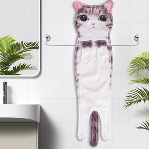 Detailed close-up of a hanging cat-shaped towel with tabby patterns in a modern bathroom