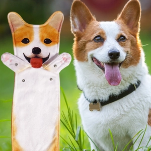 Detail of hanging Corgi dog hand towel with snap button paws and microfiber texture