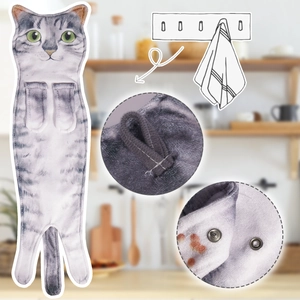 Detail view of the secure hanging loop and metal snap button on a realistic cat hand towel