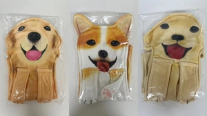 Detailed view of realistic puppy microfiber hand towels in individual packaging