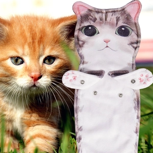 Detail of creative cat hand towel with realistic grey tabby print and snap buttons