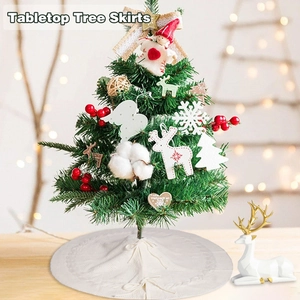 Macro shot of white cable-knit tree skirt showing soft texture and delicate wavy edges