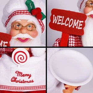 Close-up of Santa chef doll with 'Merry Christmas' embroidery and 'Welcome' wooden sign
