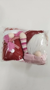 Close-up of gnome plush dolls in clear packaging for Valentine's day decoration