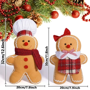 Christmas gingerbread man and woman plush dolls with chef hat and red scarf decorations