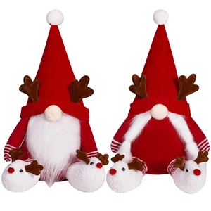 Paire de gnomes de Noël en peluche avec bois de renne et chapeaux rouges festifs