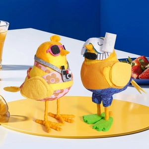 Detail of cute fabric summer birds with sunglasses and diving gear for beach decor