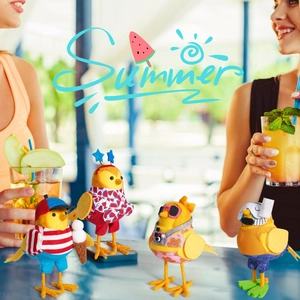 Close-up of four cute summer birds with vacation accessories like ice cream and goggles