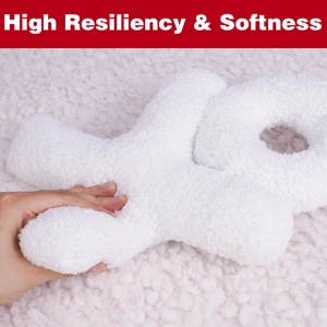Detail of soft white fleece LOVE pillow showing high resiliency and texture