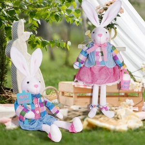 Outdoor festive display of Easter bunnies in madras plaid outfits and lace skirts