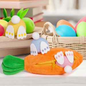 Detail of Easter carrot zipper pouch with colorful bunny butt plush hanging ornaments