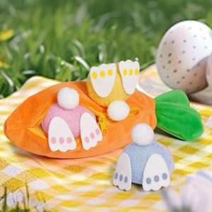 Detail of Easter carrot zipper pouch with three colorful plush bunny stuffed toys