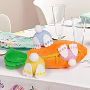 Close-up of Easter carrot zipper pouch with three colorful plush bunny dolls inside