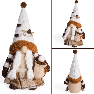 Detail of knitted coffee gnome with light, showing white braids and coffee bean bag