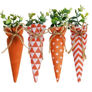 Set of four orange Easter fabric carrots with patterns and green leaves for festive decor