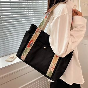 Black nylon tote bag with floral embroidered strap for women's casual commute